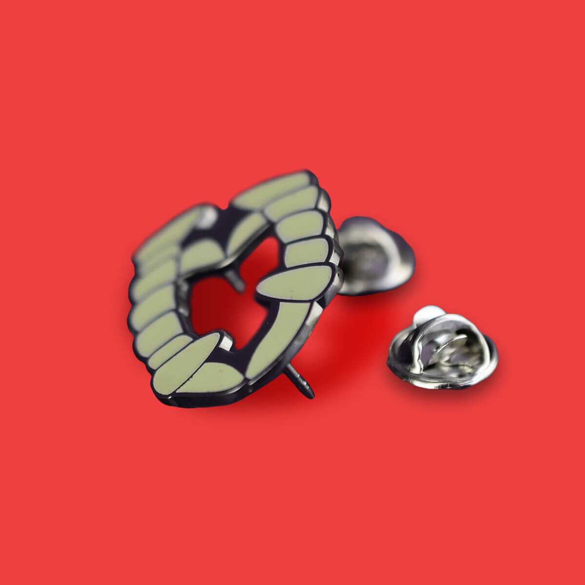 Plastic Dracula Teeth Enamel Pin | Luna
